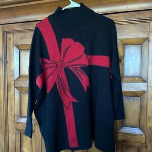 Black Sweater with Red Bow Design